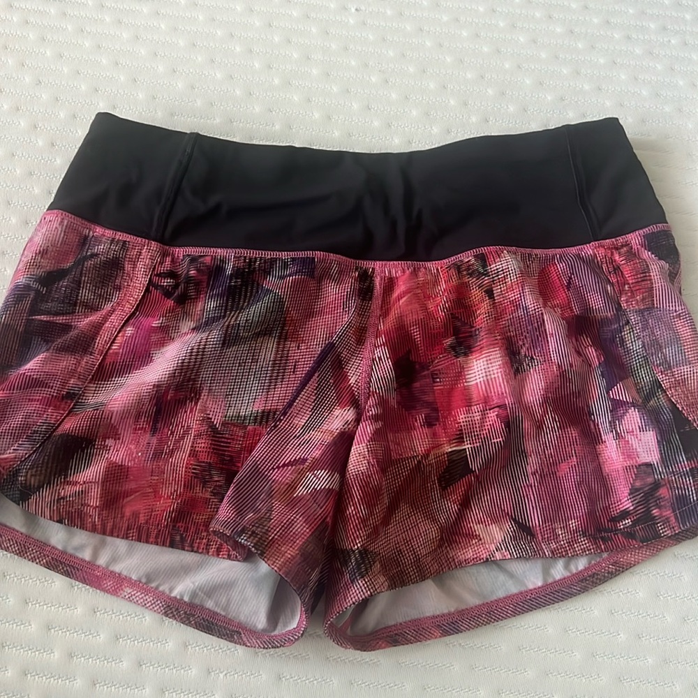 Size 4 Lululemon pink and red shorts